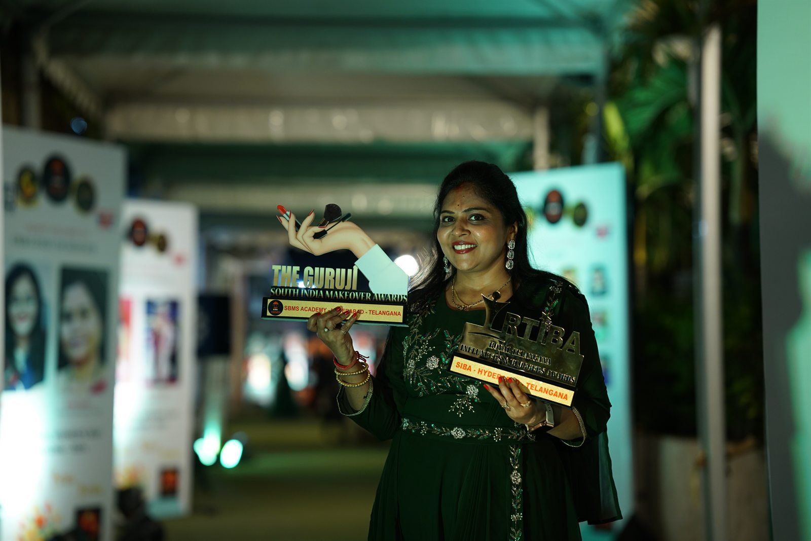 HV Angels trainer displaying South India makeover awards