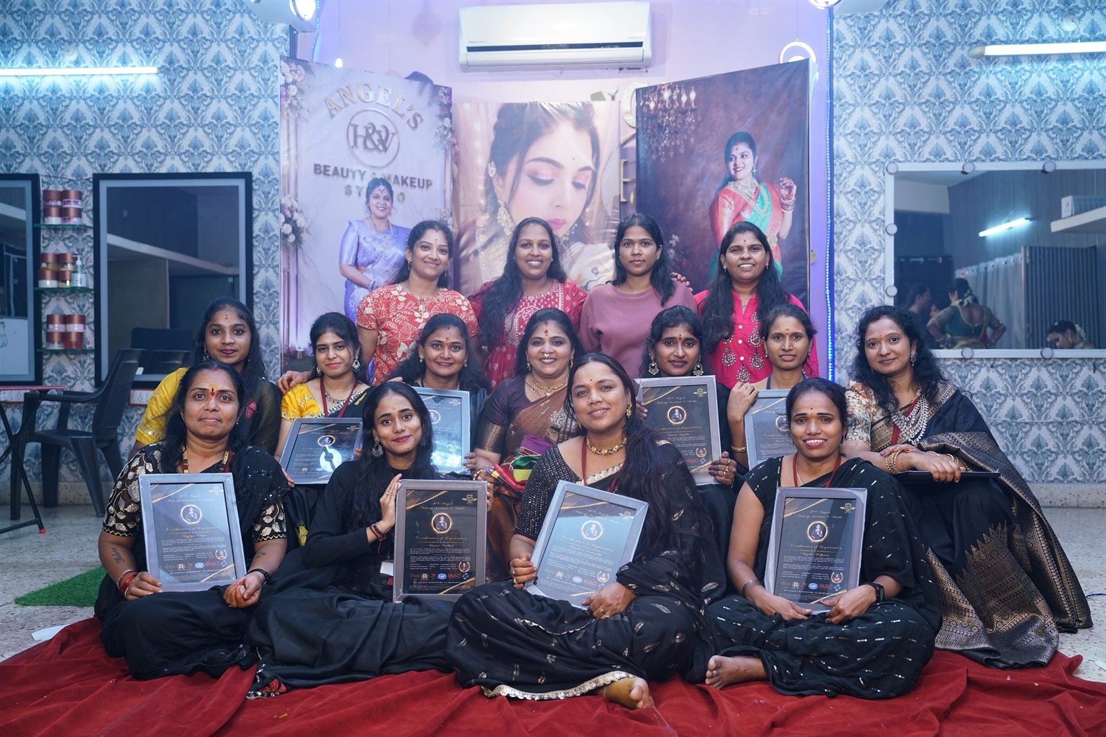 HV Angels students holding their course certificates